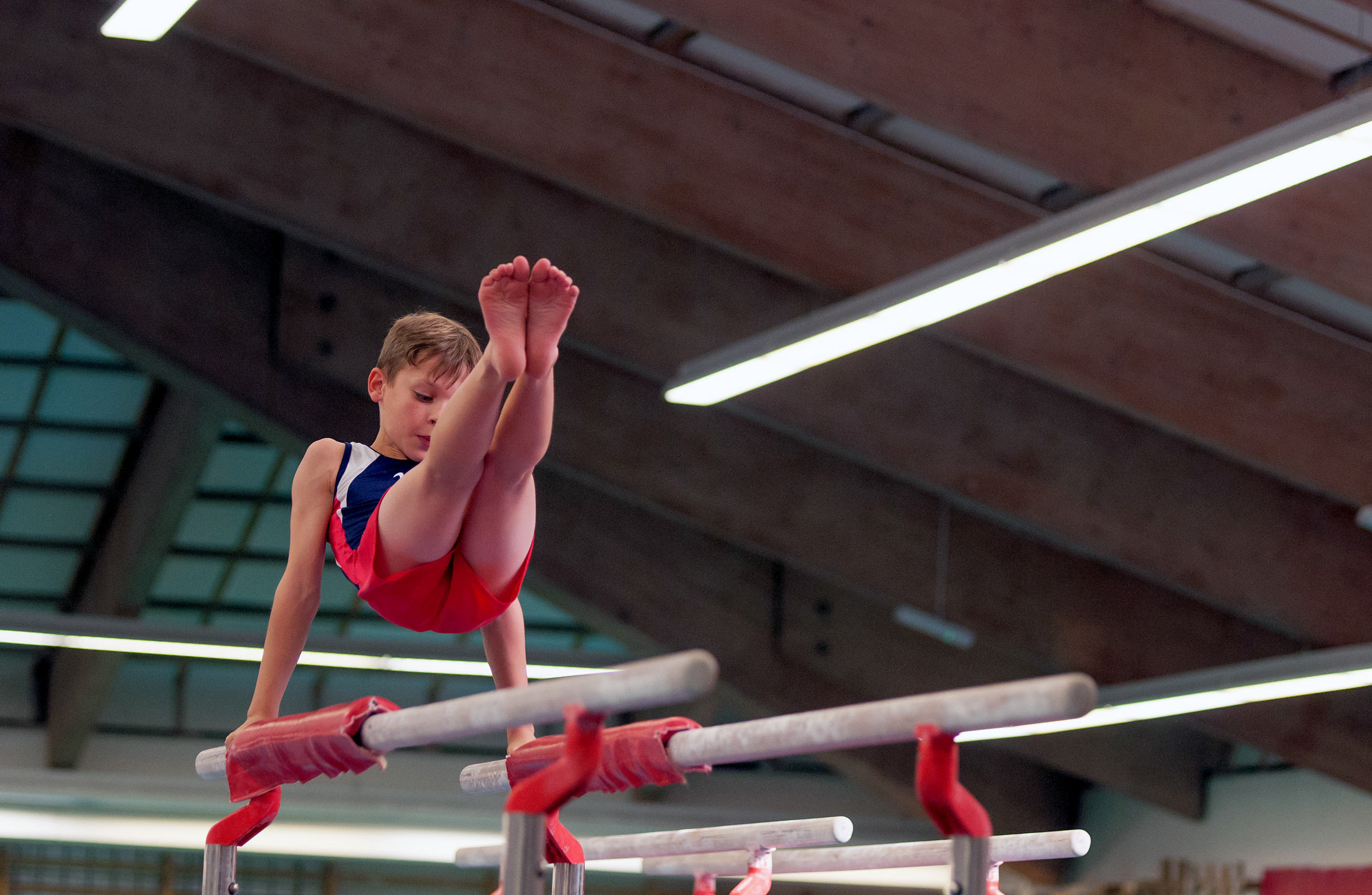 gymnast on parallel bars